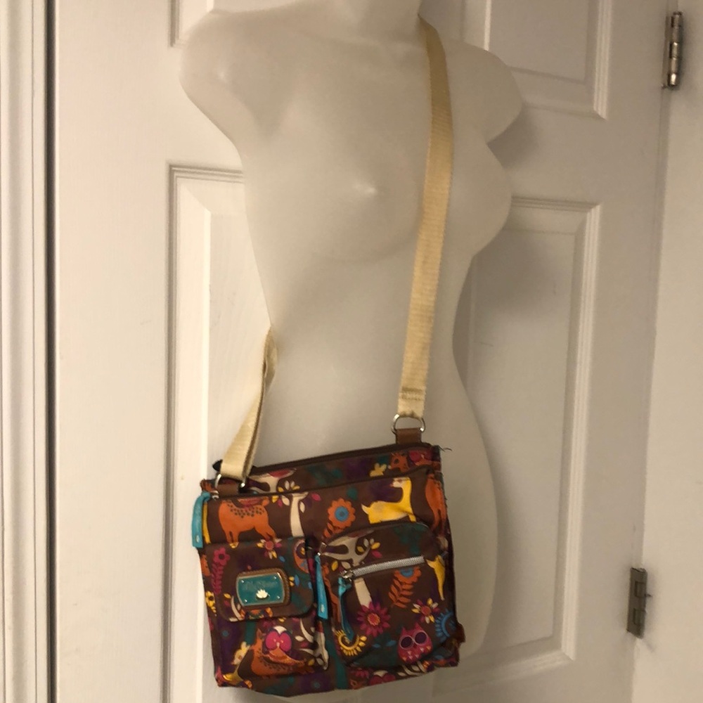 This beautiful Lily Bloom Regina Mid Crossbody Bag Forest Animals Print